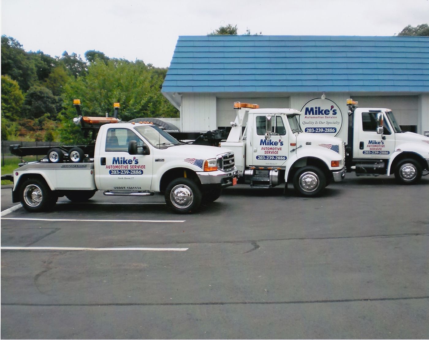 Medium and light-duty wreckers at the shop